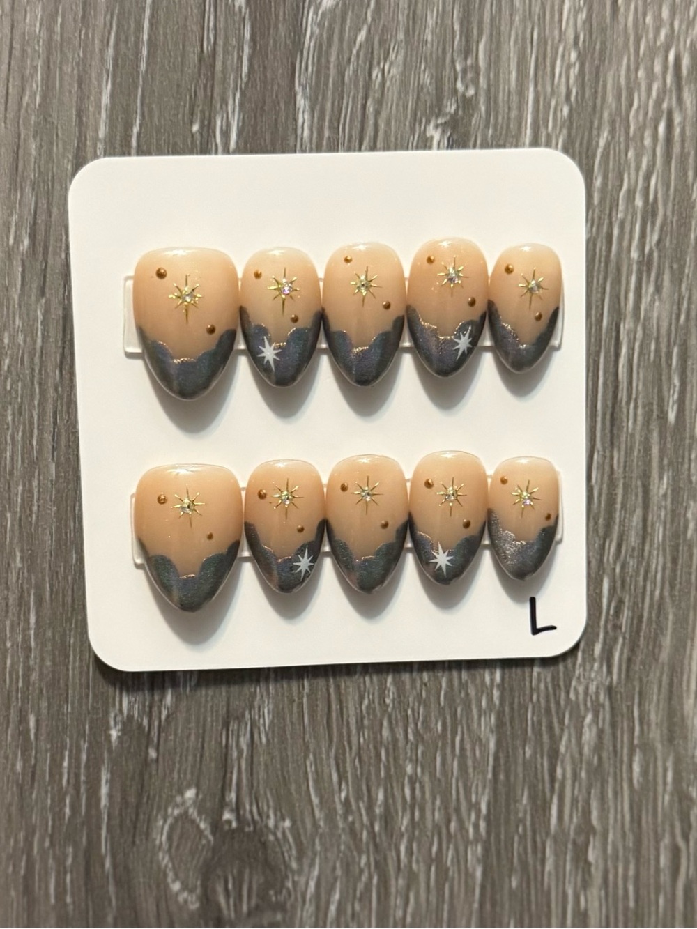 Neutral Beige Press-On Nails with Metallic Gray Tips and Star Accents